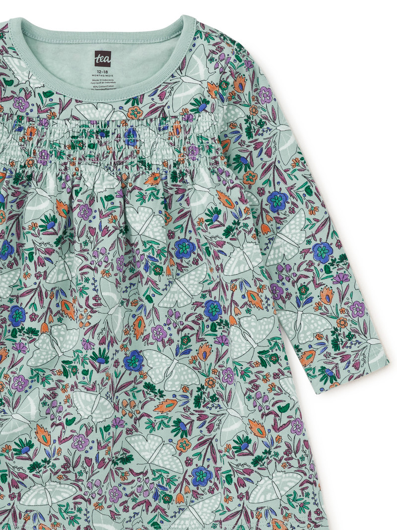 Smocked Empire Baby Dress in Iznik Moth Floral - View 2